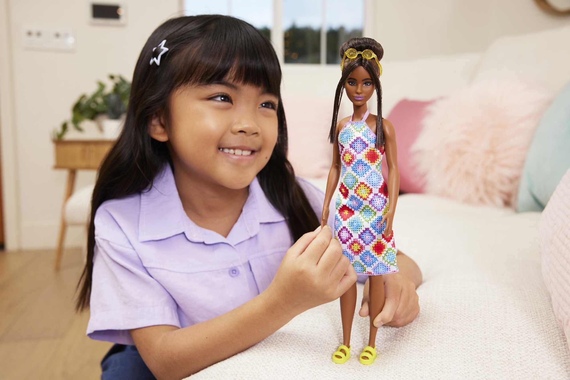 Barbie Fashionistas #210 crochet halter dress adds colorful, comfy fashion for imaginative play.