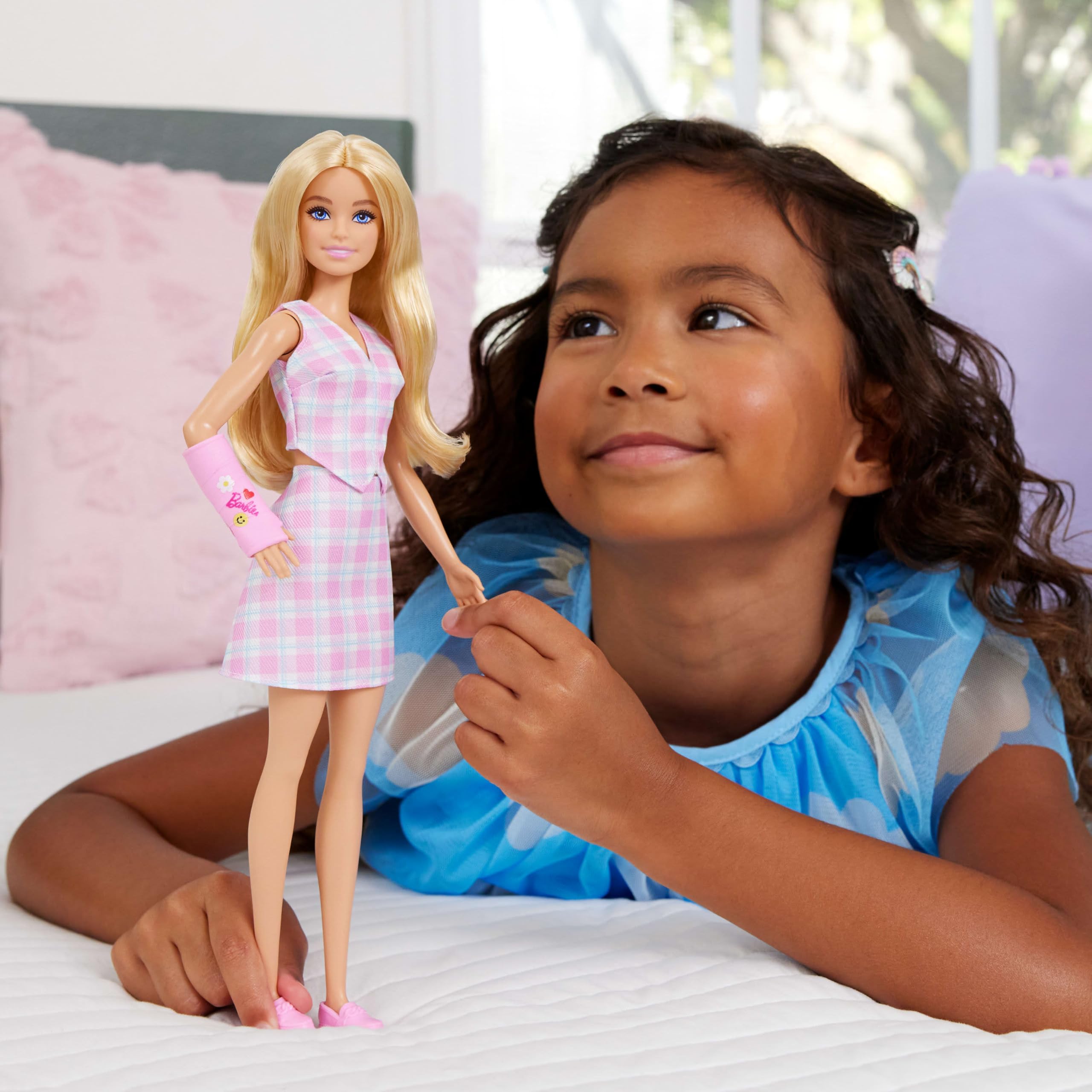 Barbie Fashionistas #243 pink arm cast doodles spark playful storytelling.