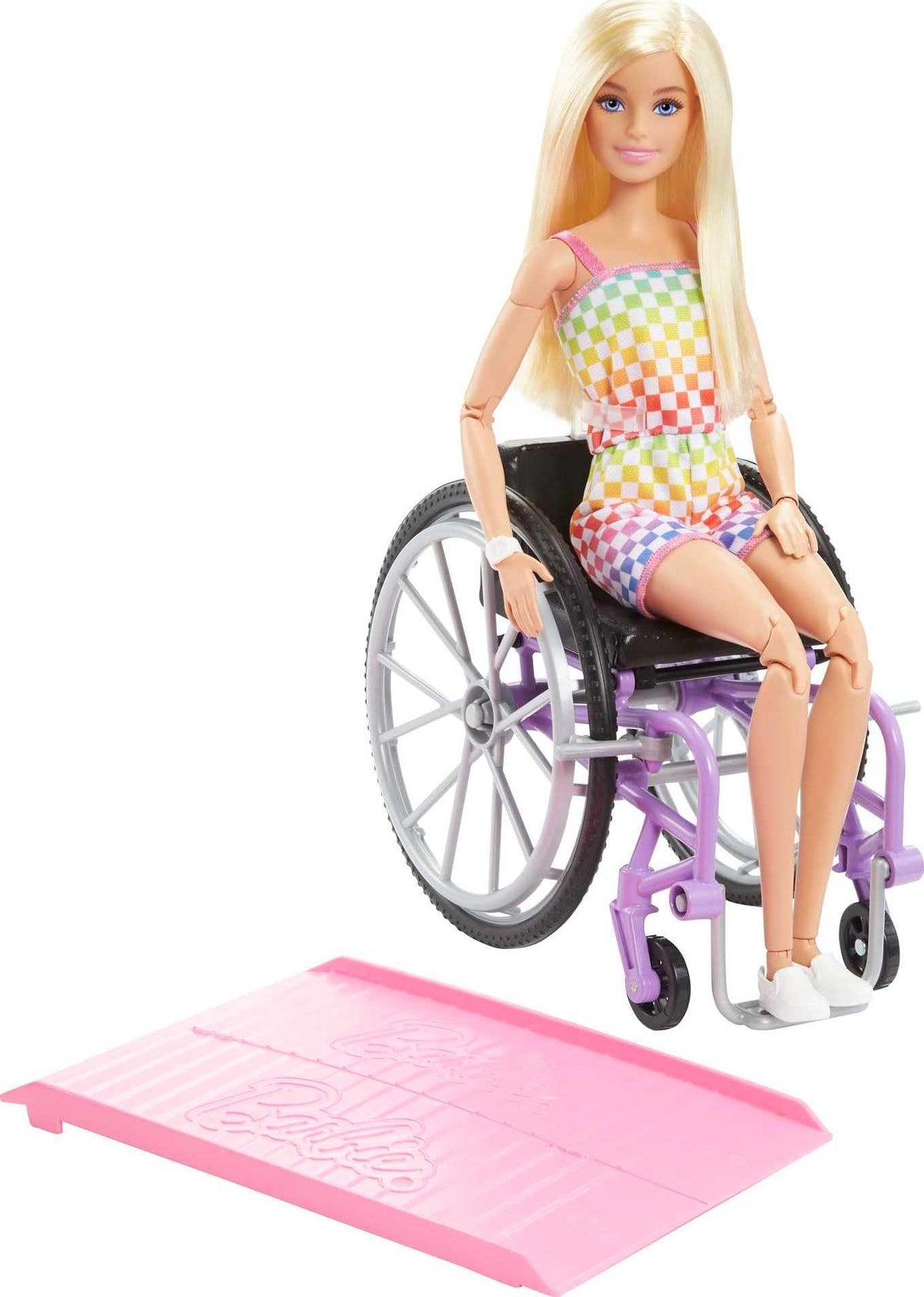 Barbie Fashionistas doll with blonde hair in rainbow romper inspires imaginative play and styling.