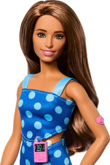 Barbie Fashionistas doll CGM monitor and heart tape support inclusive storytelling.