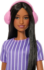 Barbie Fashionistas doll 245 holding a working fidget spinner for on-the-go focus