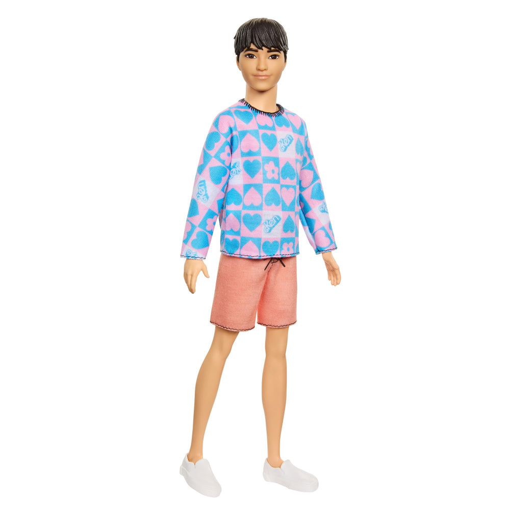 Barbie Fashionistas Ken doll slender body and black hair enable versatile styling.