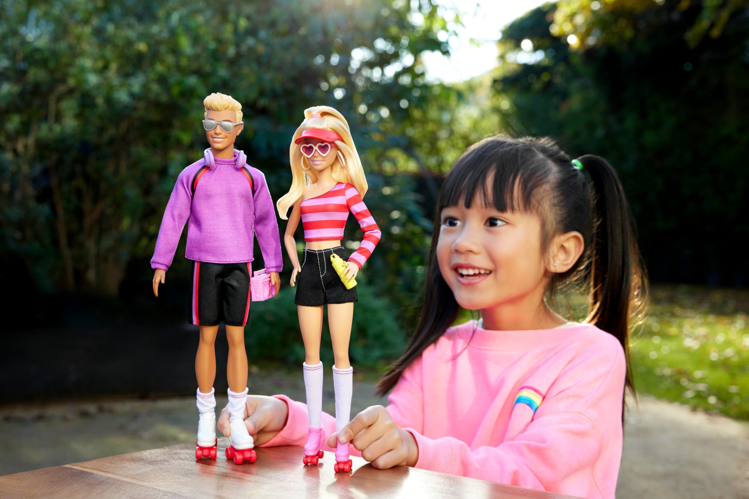 Barbie Fashionistas pink roller skates for dynamic play and movement.