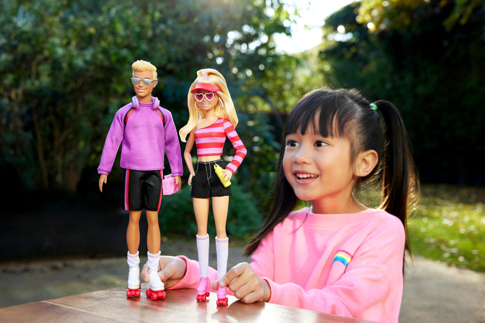 Barbie Fashionistas pink roller skates for dynamic play and movement.