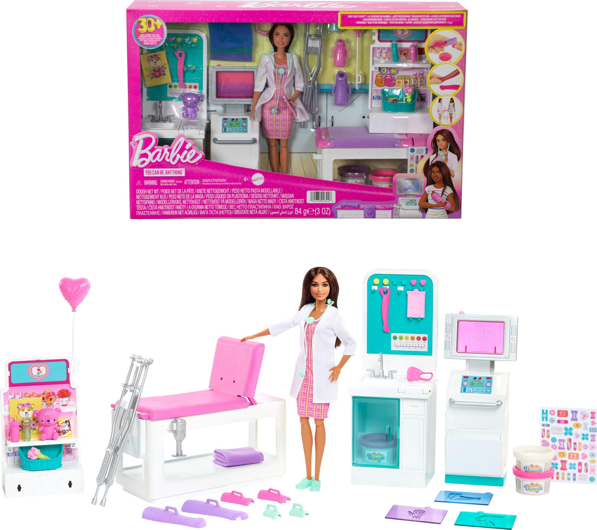 Barbie Fast Cast Clinic doll at exam table for pretend medical care.