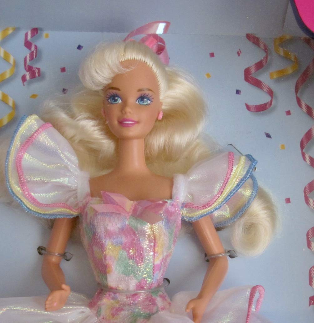 Barbie Happy Birthday Doll outfit close up showing earrings and hair bow for dress up play
