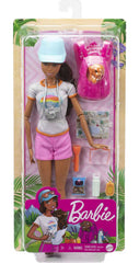 Barbie hiking doll with glasses and camera to observe and capture moments.
