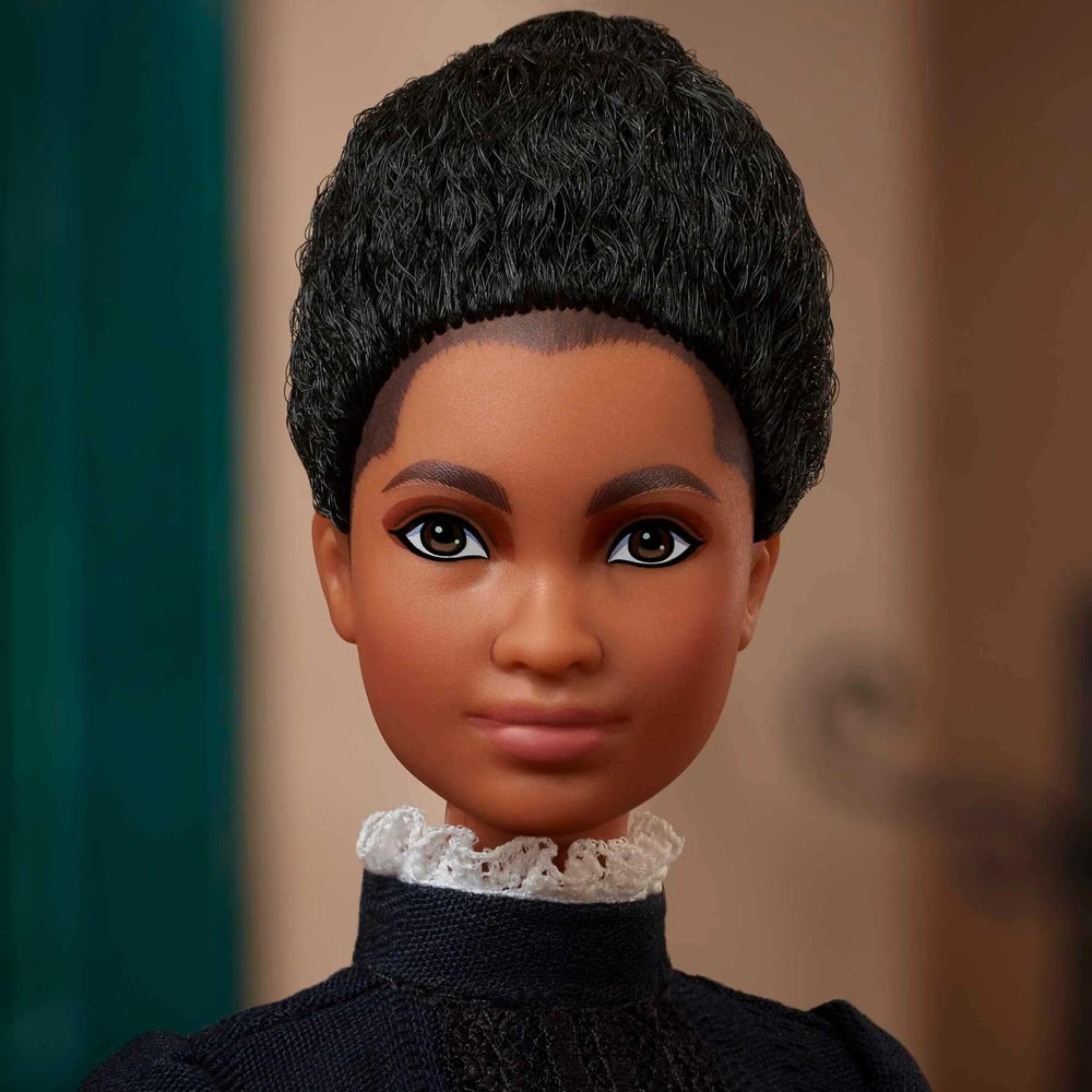Memphis Free Speech newspaper accessory with Ida B. Wells Barbie for storytelling.