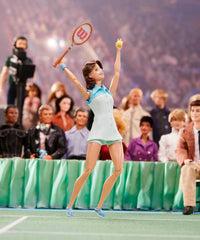 Barbie Billie Jean King doll wearing two-tone dress captures iconic sports style for display