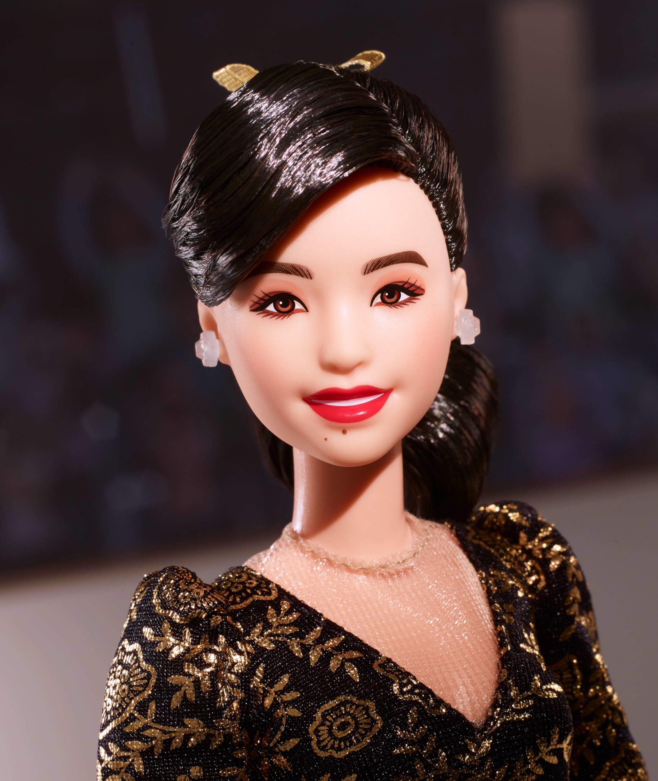 Barbie Inspiring Women gold and black leotard highlights collectible history