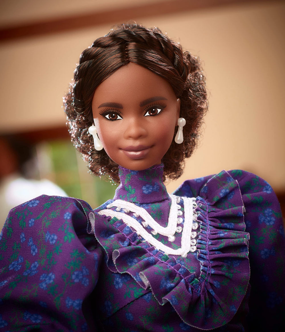 Barbie Inspiring Women doll with Wonderful Hair Grower accessory for authentic detail.