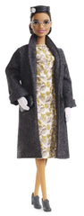 Barbie Inspiring Women Rosa Parks doll in floral dress and coat for display.