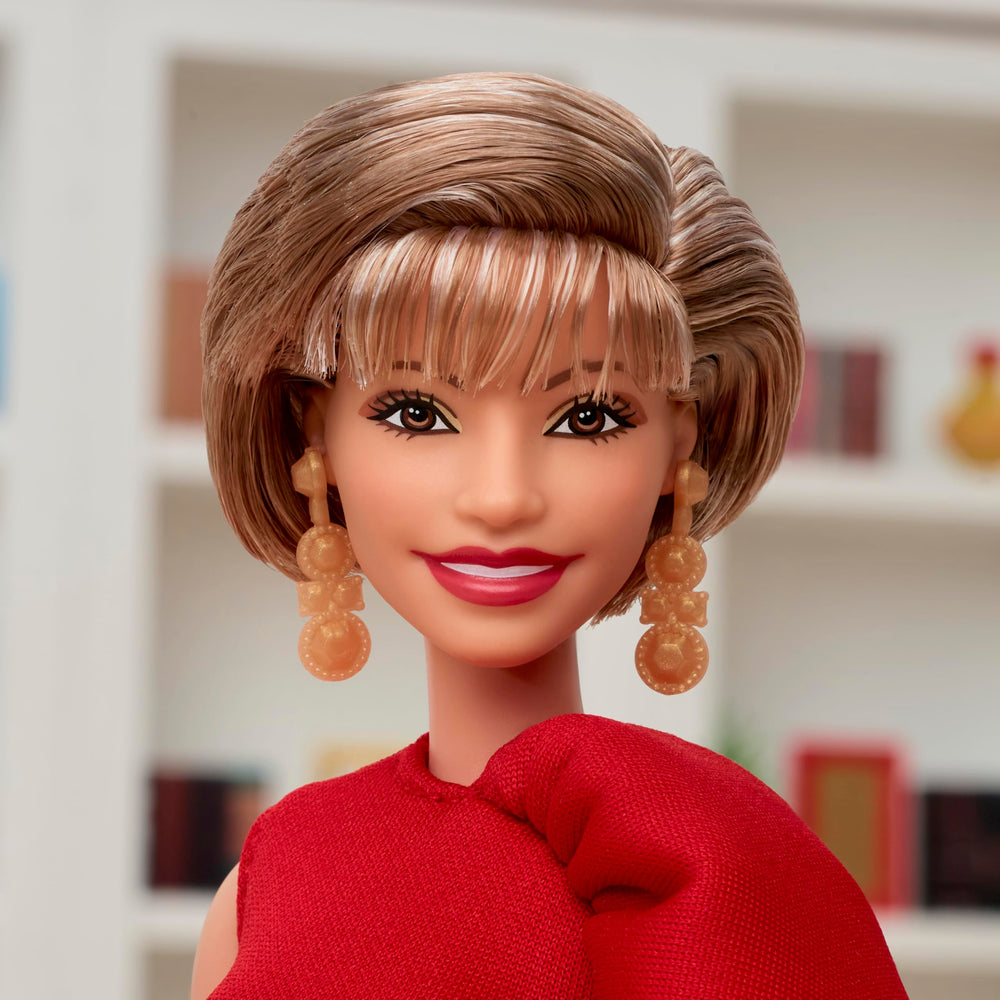 Barbie Isabel Allende doll with Perla the dog, perfect for display and storytelling.