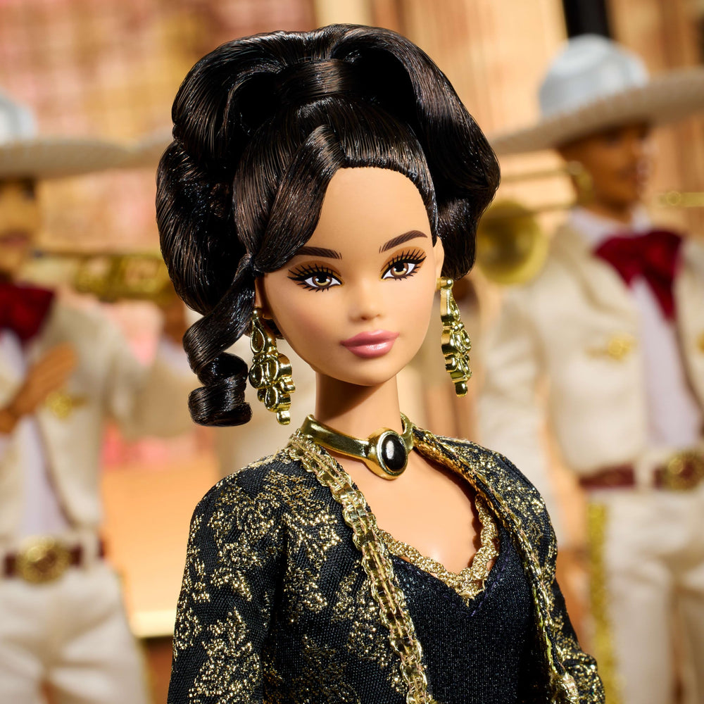 Barbie Juan Gabriel doll in black bodysuit, elegant concert-ready look.