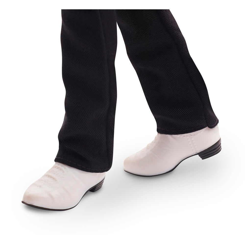Barbie Ken doll stand included for steady posing and display.