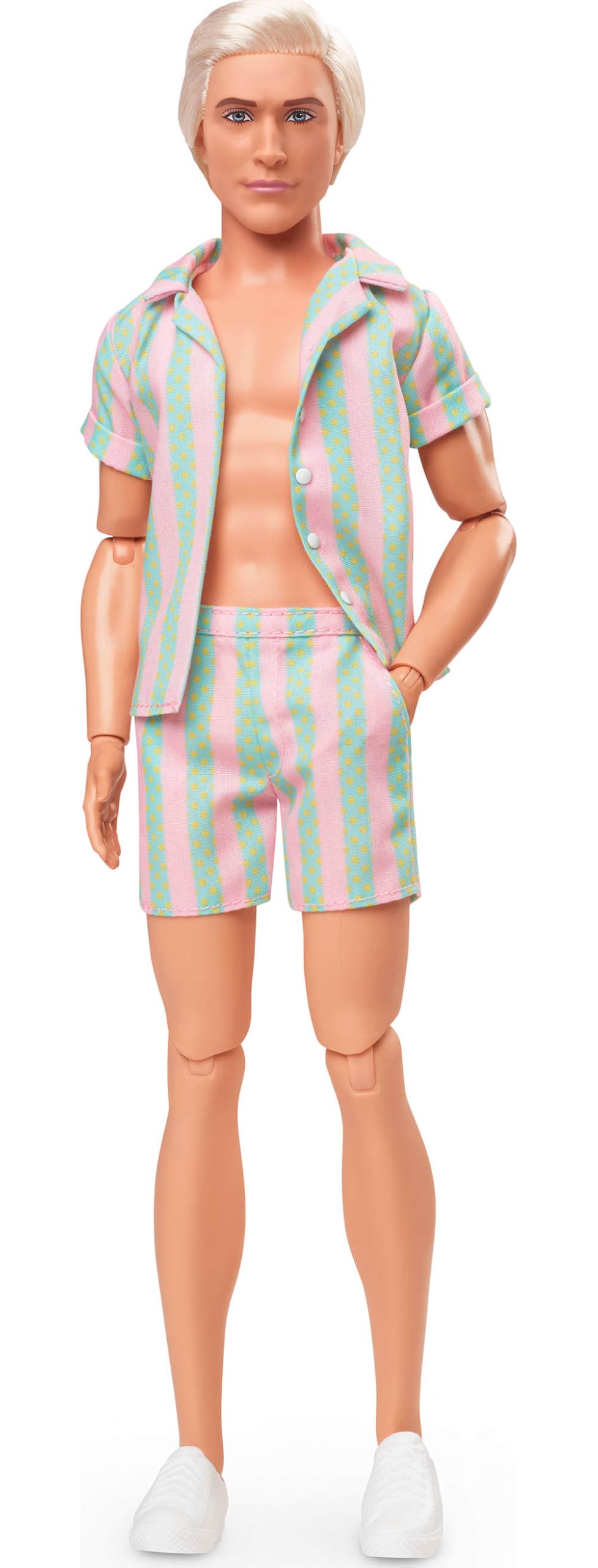 Barbie Ken with posable body and display packaging, collectible presentation.