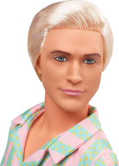 Barbie Ken with surfboard, casual beach look, great for imaginative play.