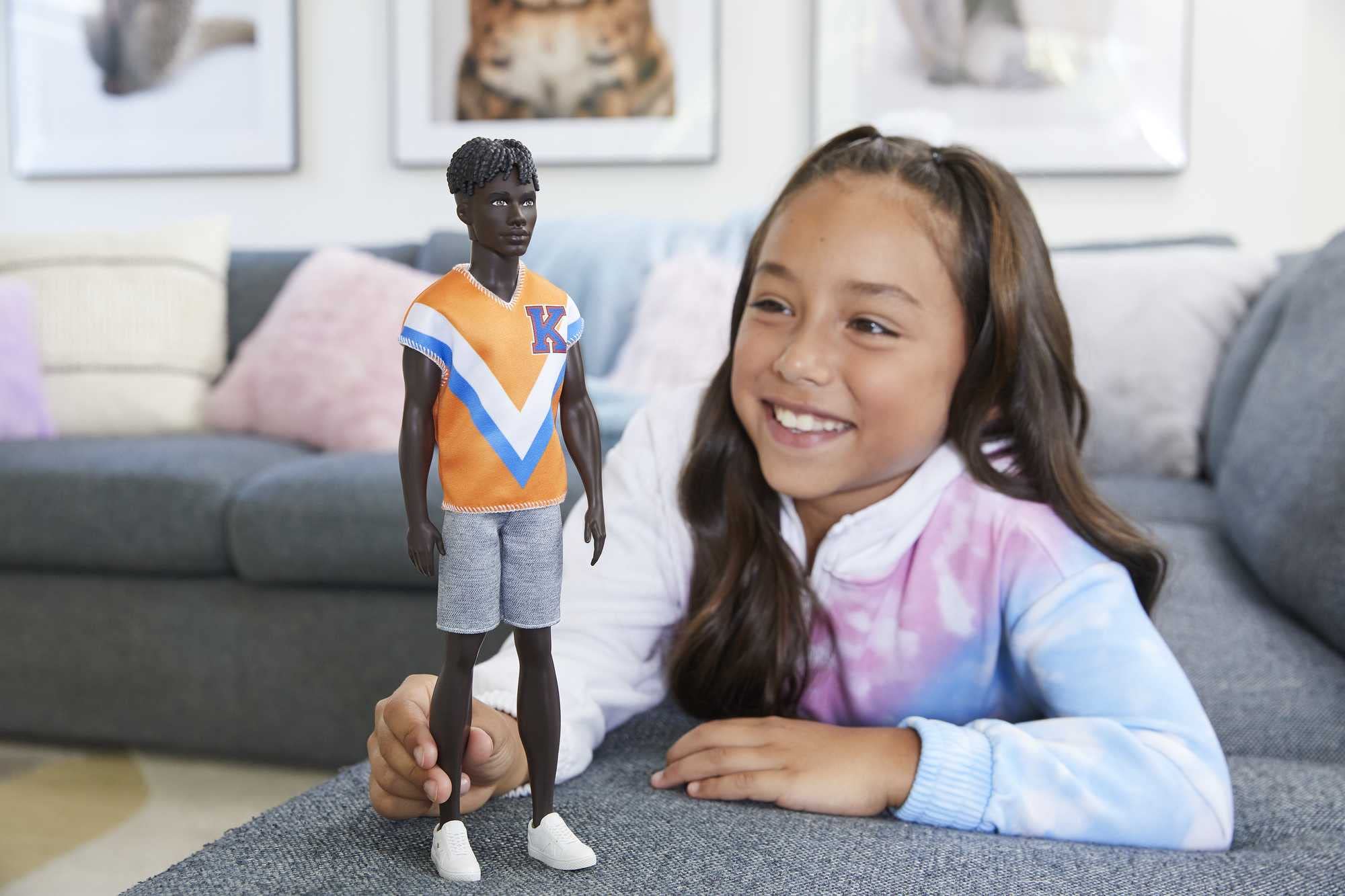 Barbie Ken Fashionistas 203 in orange jersey, ideal for active play.