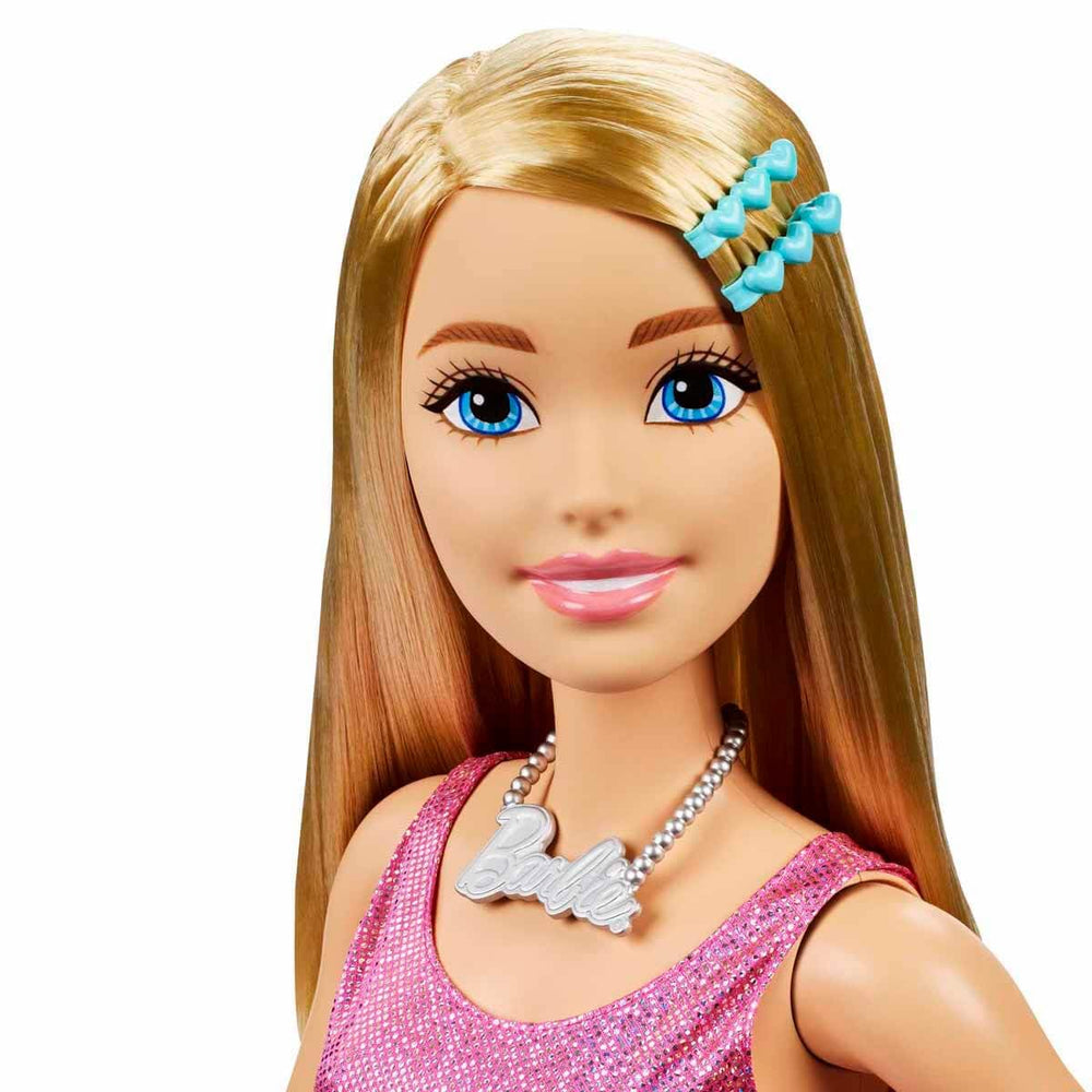 Barbie large doll wearing pink dress and silver belt for stylish storytelling.