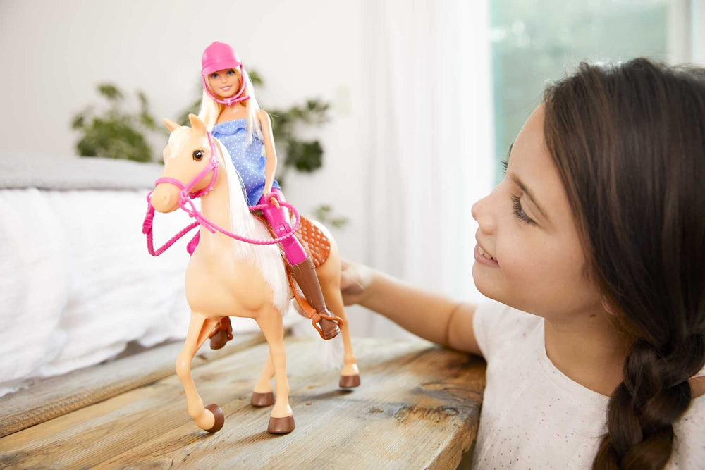 Barbie light brown horse with saddle and bridle for adventures.