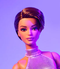 Barbie Looks No. 22 halter neck paired with silver heels for glam fashion shots.