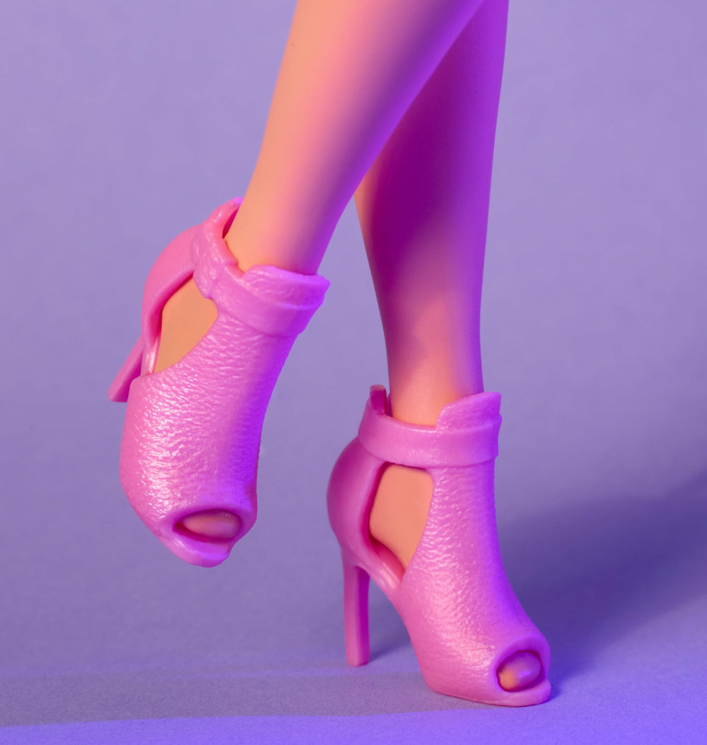 Barbie Looks No. 24 includes a doll stand and Certificate of Authenticity.