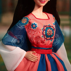 Barbie Lunar New Year doll with pearl hair accessory for refined styling.