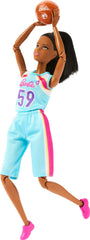 Barbie Made to Move brunette doll shows 22 joints for dynamic posing.