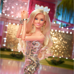 Barbie Margot Robbie gold heart earrings; adds sparkle to gift-ready display.