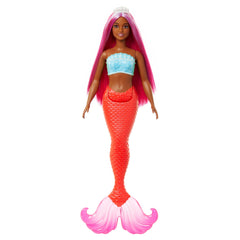 Barbie mermaid doll with magenta hair and headband enhances imaginative play.