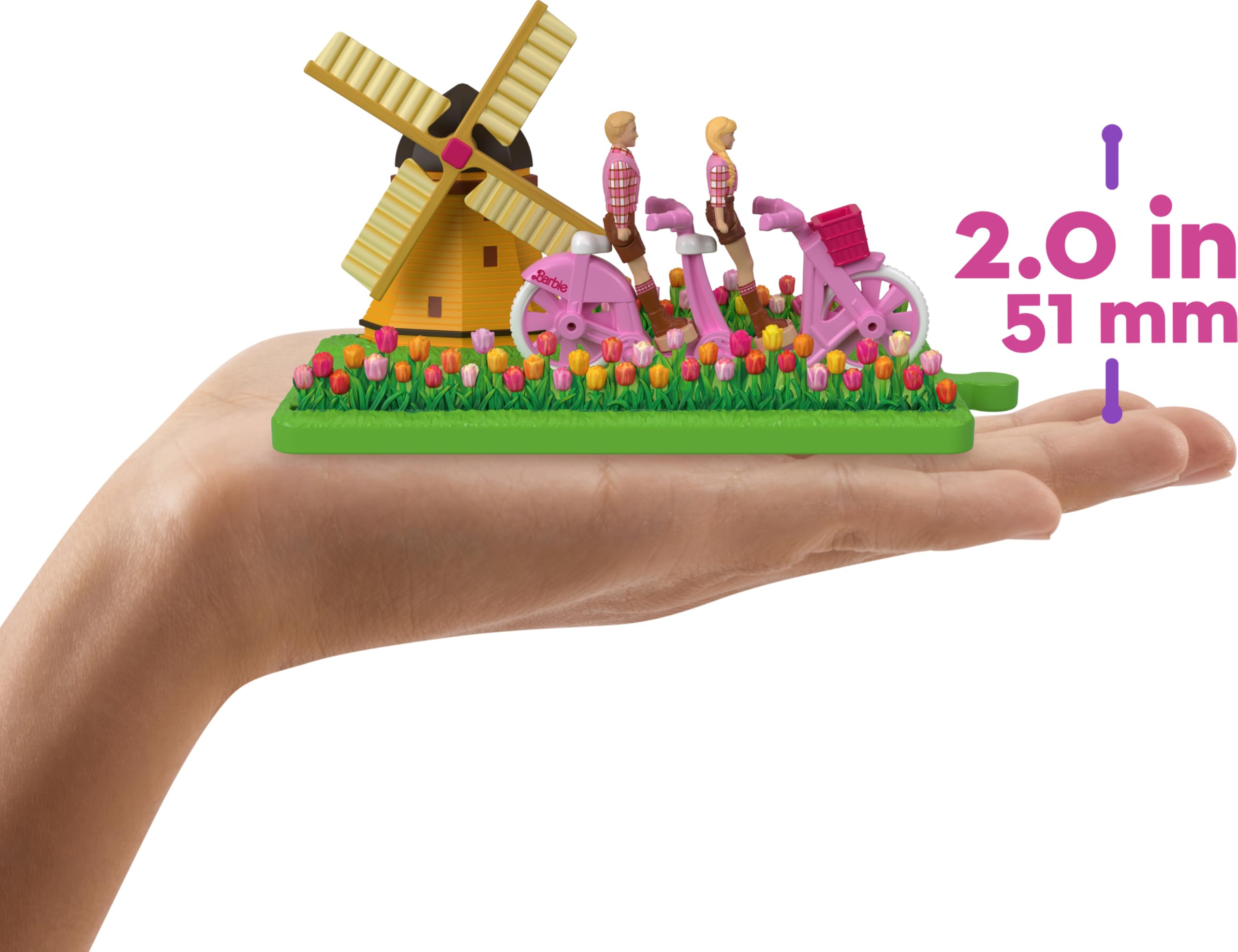 Barbie The Movie mini-dolls on heart base for easy display and versatile poses.