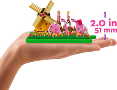 Barbie The Movie mini-dolls on heart base for easy display and versatile poses.