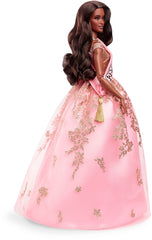 Barbie President Doll glows with shimmering details and satin sash.