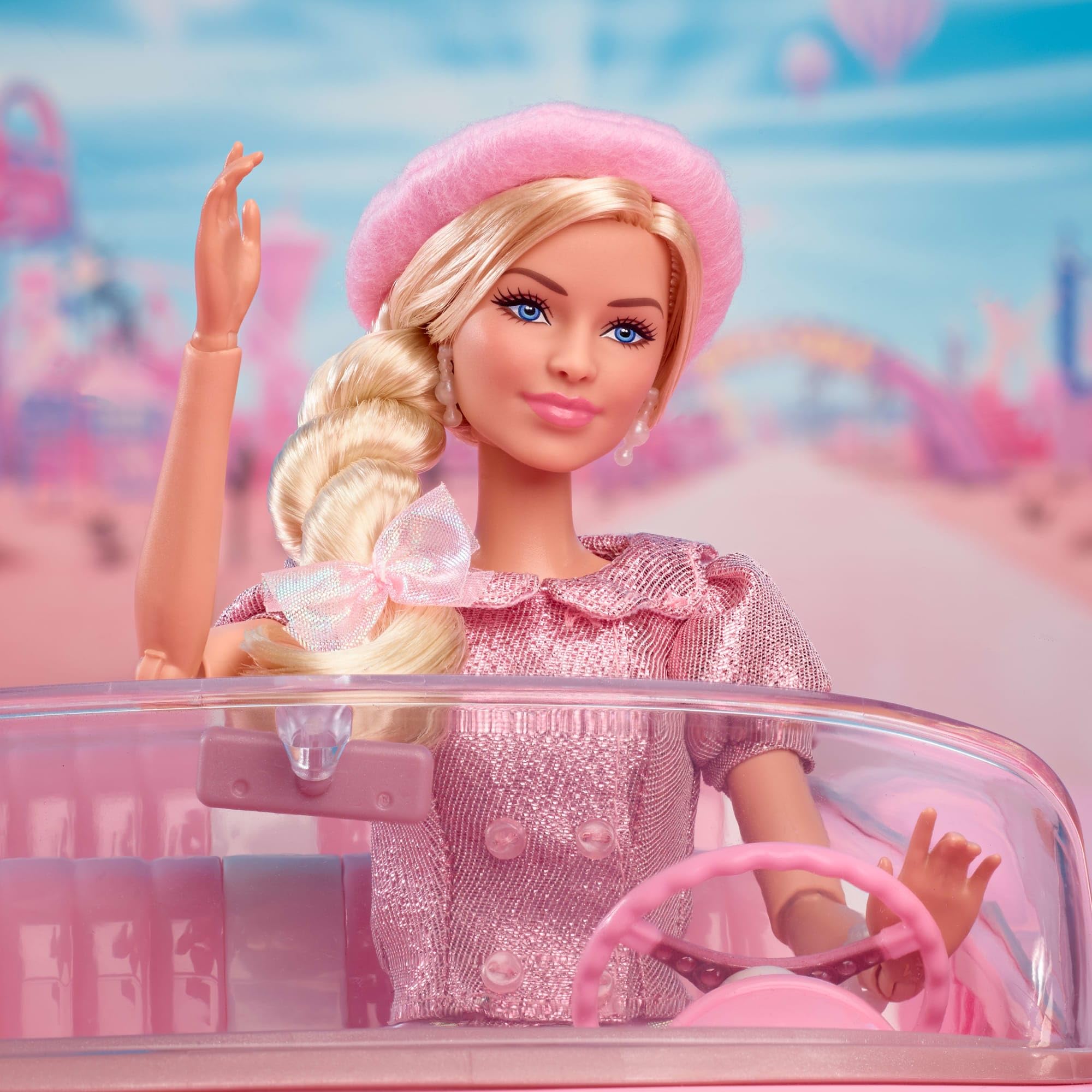 Barbie jewelry like pearl earrings and bracelet enhance the collectible charm.
