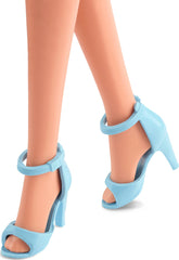 Barbie The Movie doll features wavy blonde hair and styling