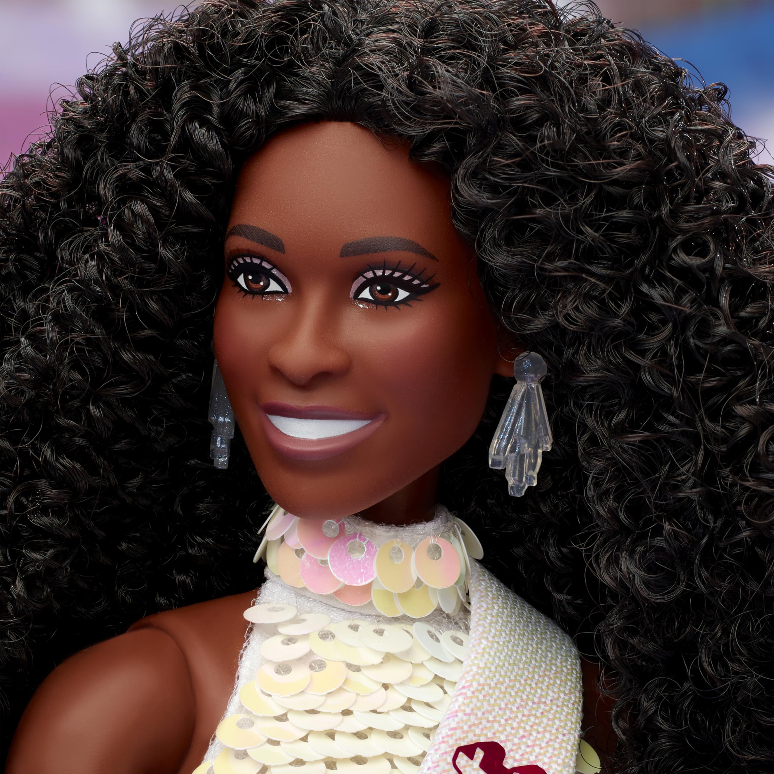 Barbie doll wearing golden heels to complete the elegant presidential outfit.