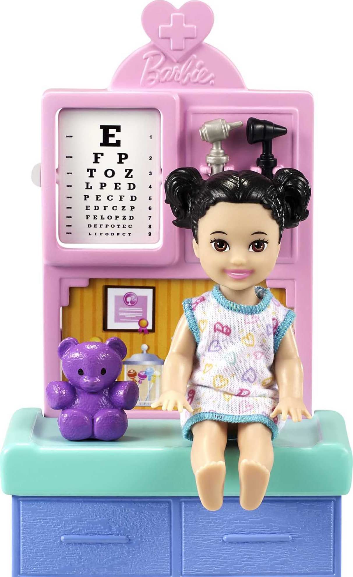 Barbie brunette patient doll as pretend exam partner.