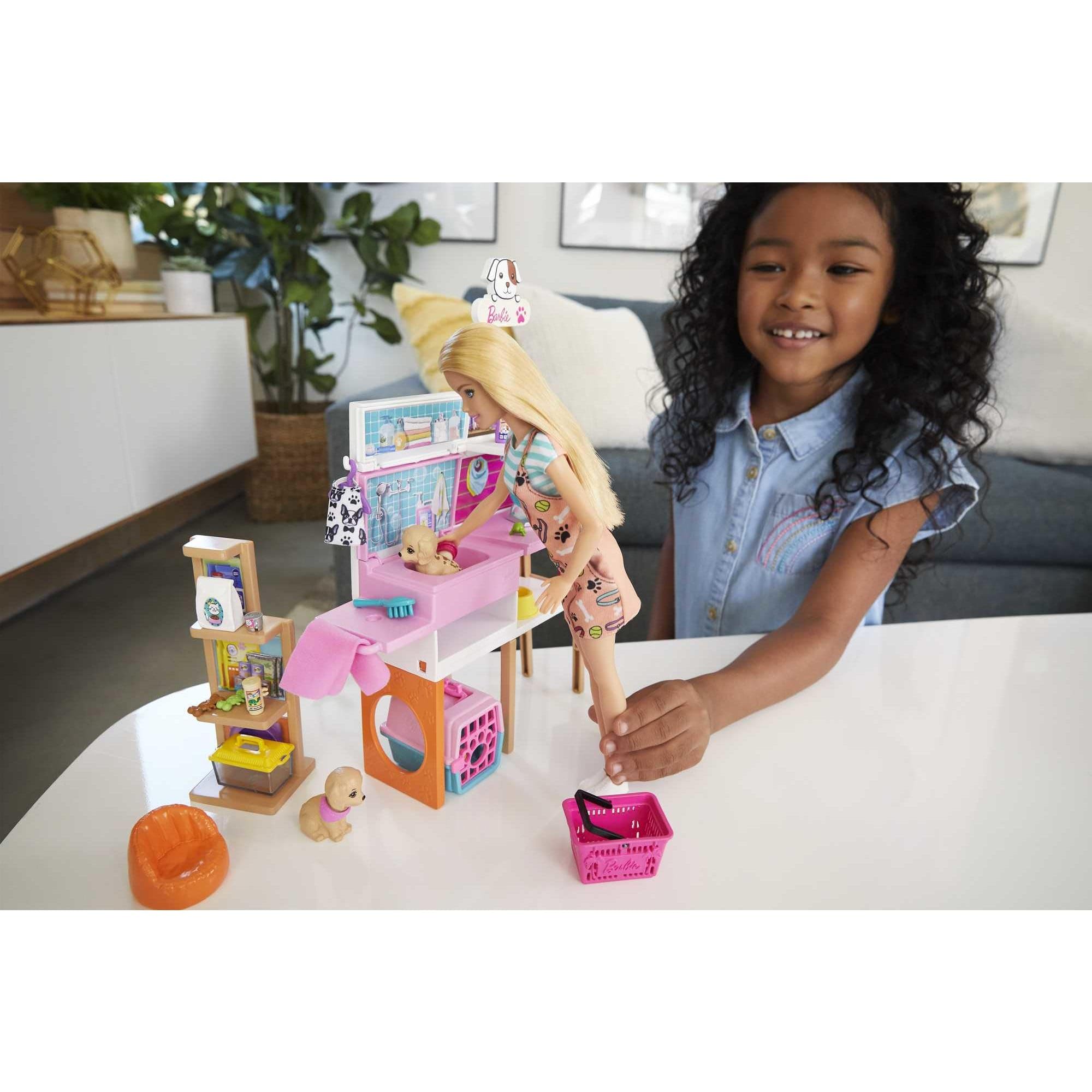 Barbie pet boutique checkout counter enabling pretend shopping and rewards-like play.