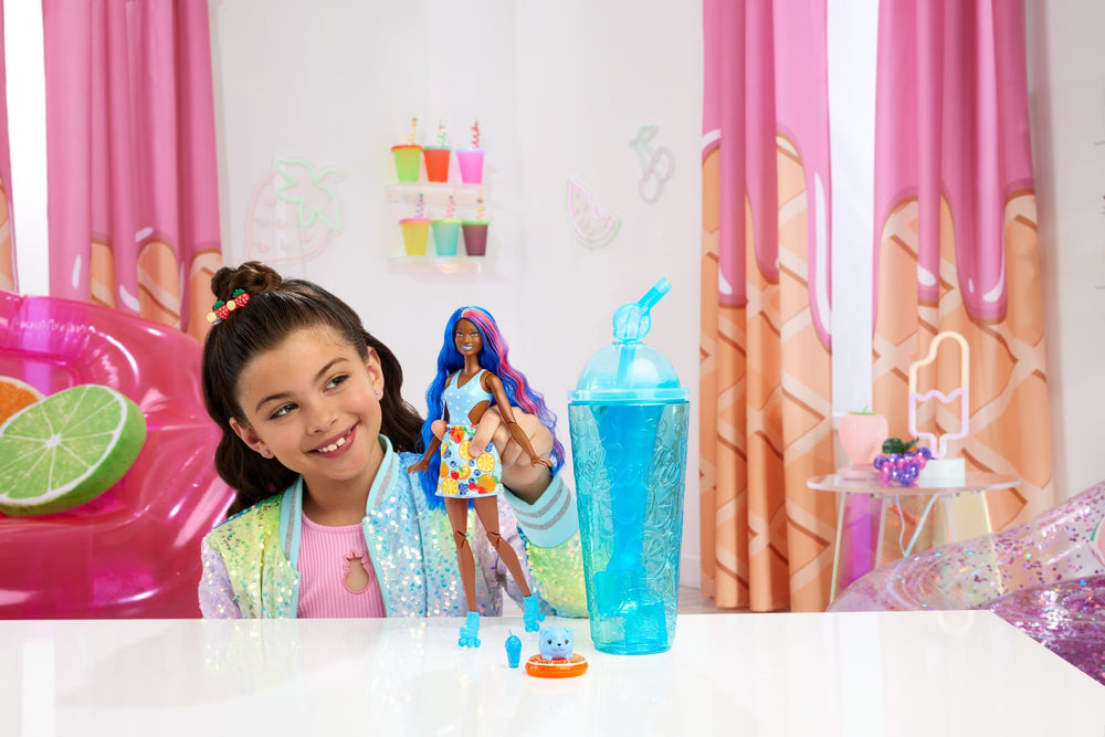 Barbie Pop Reveal doll with blue hair demonstrates color-change makeup moments for kids