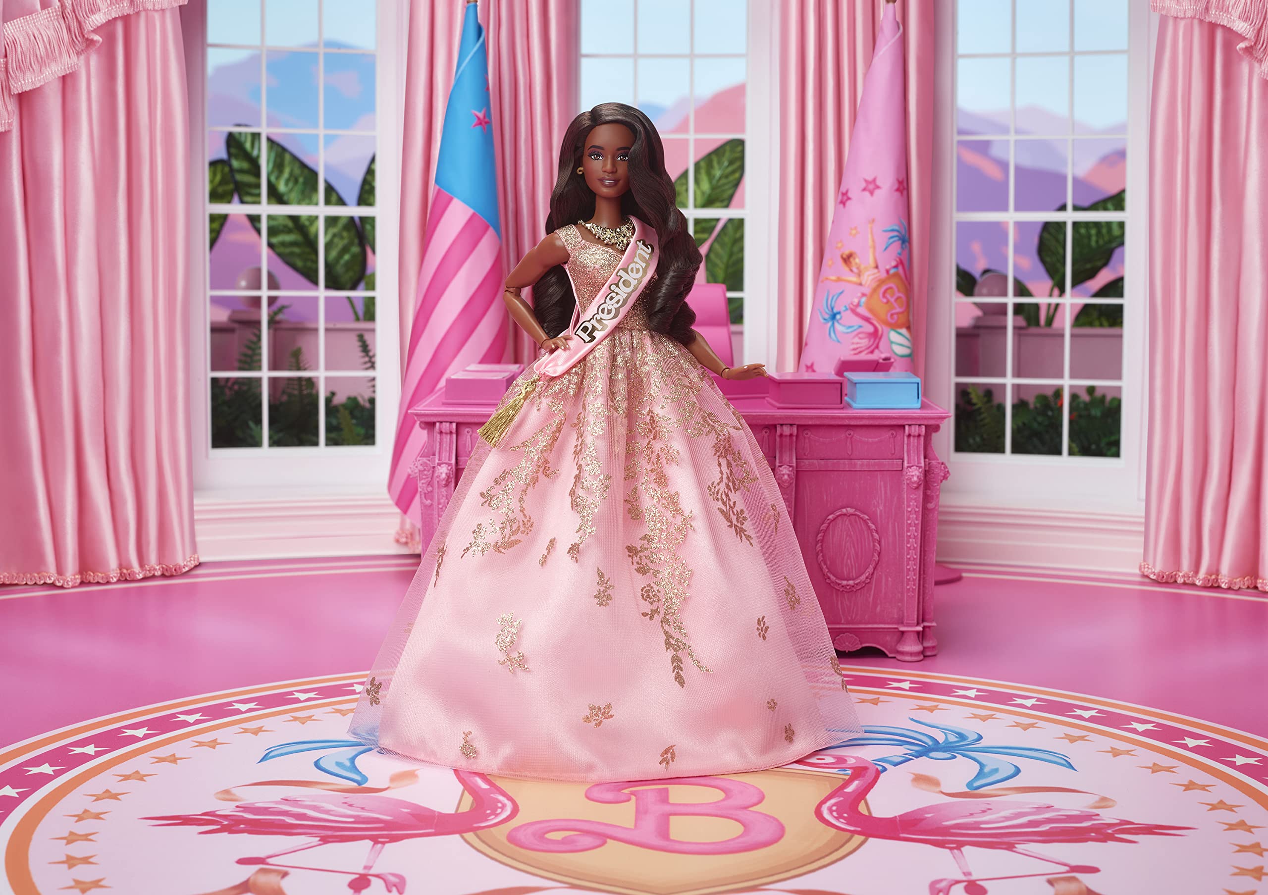 Barbie President Doll off-shoulder bodice with gold accents enhances cinematic look.