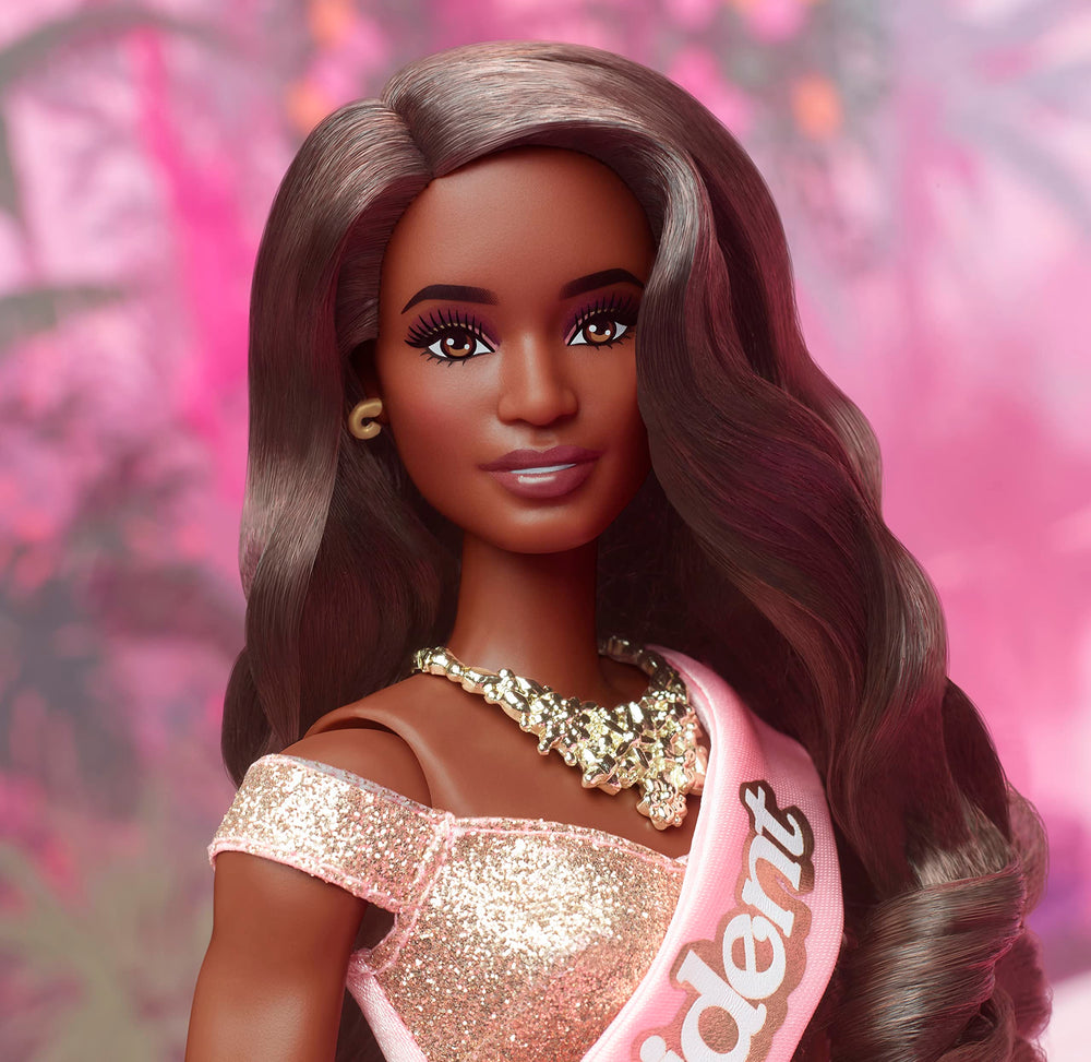 Barbie The Movie premium doll features bouncy curls and elaborate necklace.