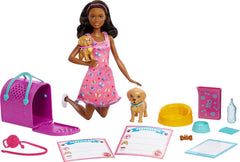 Barbie Pup Adoption playset with brunette doll in pink dress for nurturing imaginative play.