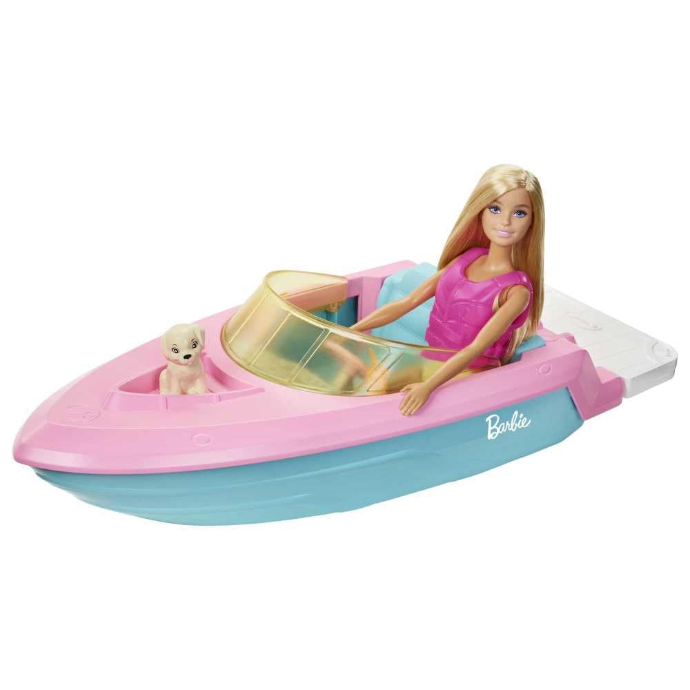 Barbie puppy sits on the bow for companionship during adventures.