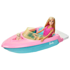 Barbie puppy sits on the bow for companionship during adventures.