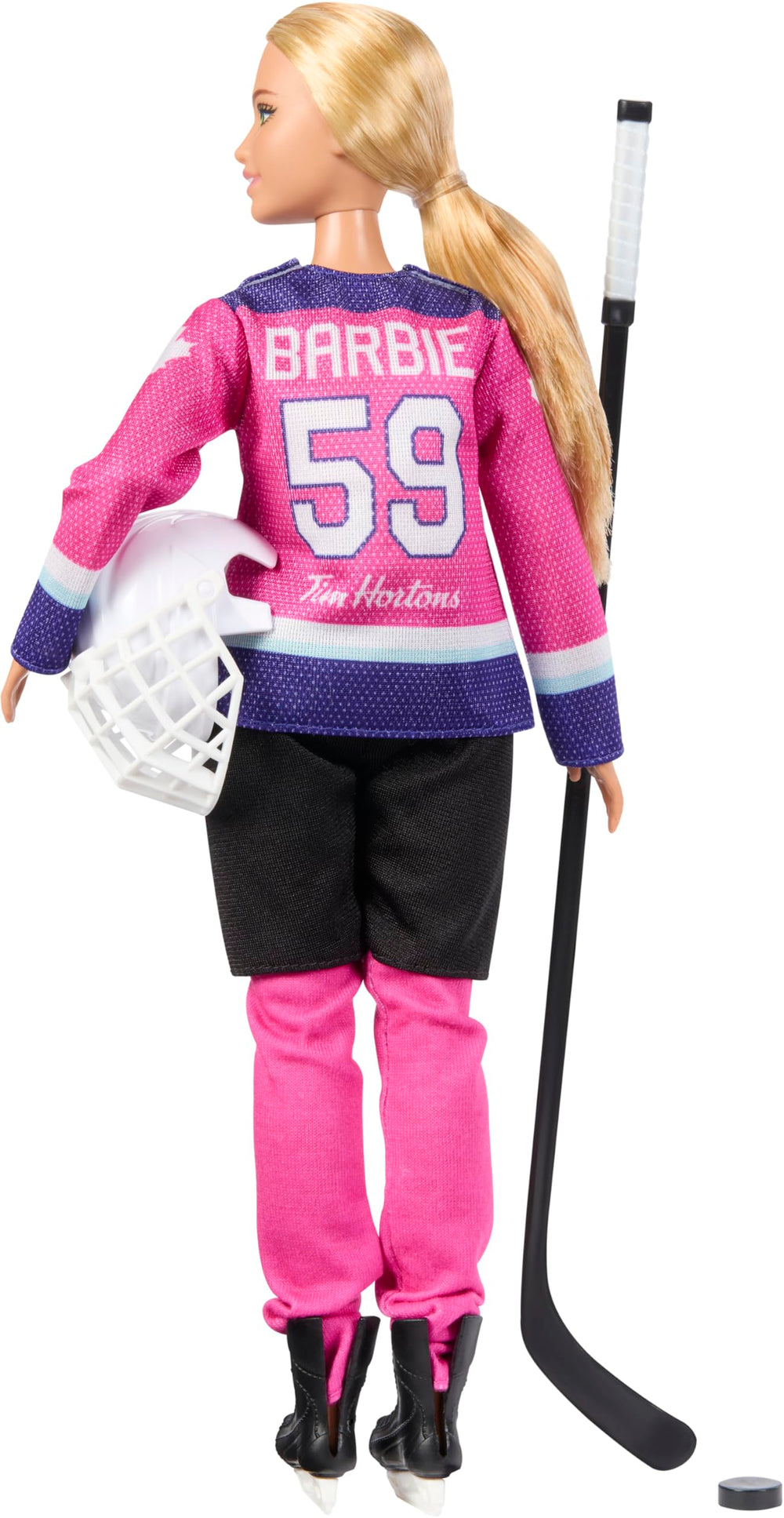 Barbie PWHL doll with puck, ready to pass and score during play.