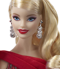 Close-up of the red-train gown detail on the Barbie Holiday Doll