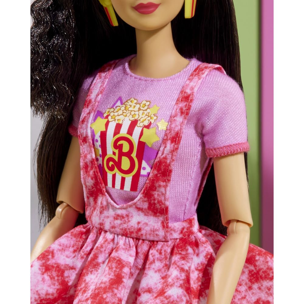 Barbie Rewind doll popcorn earrings add playful detail for display.