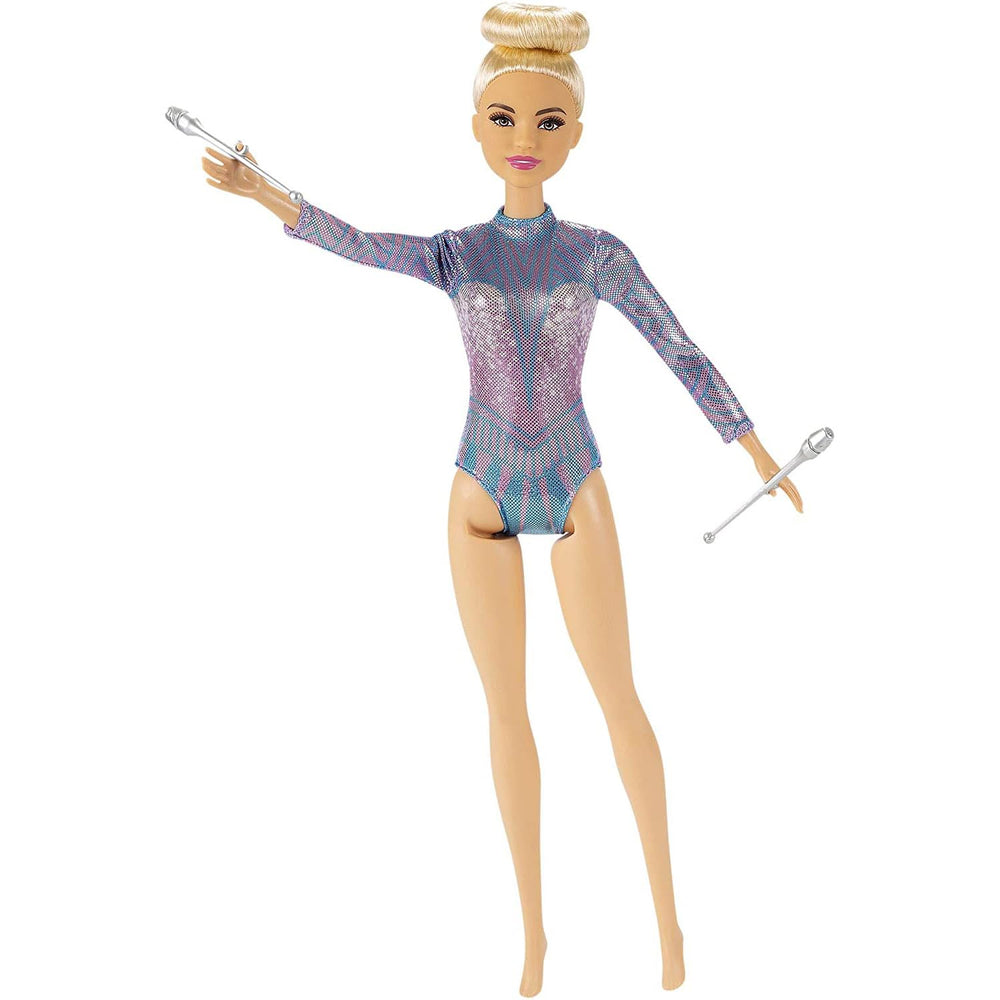 Barbie rhythmic gymnast doll packaging image showing included accessories.