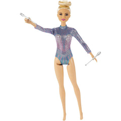 Barbie rhythmic gymnast doll packaging image showing included accessories.
