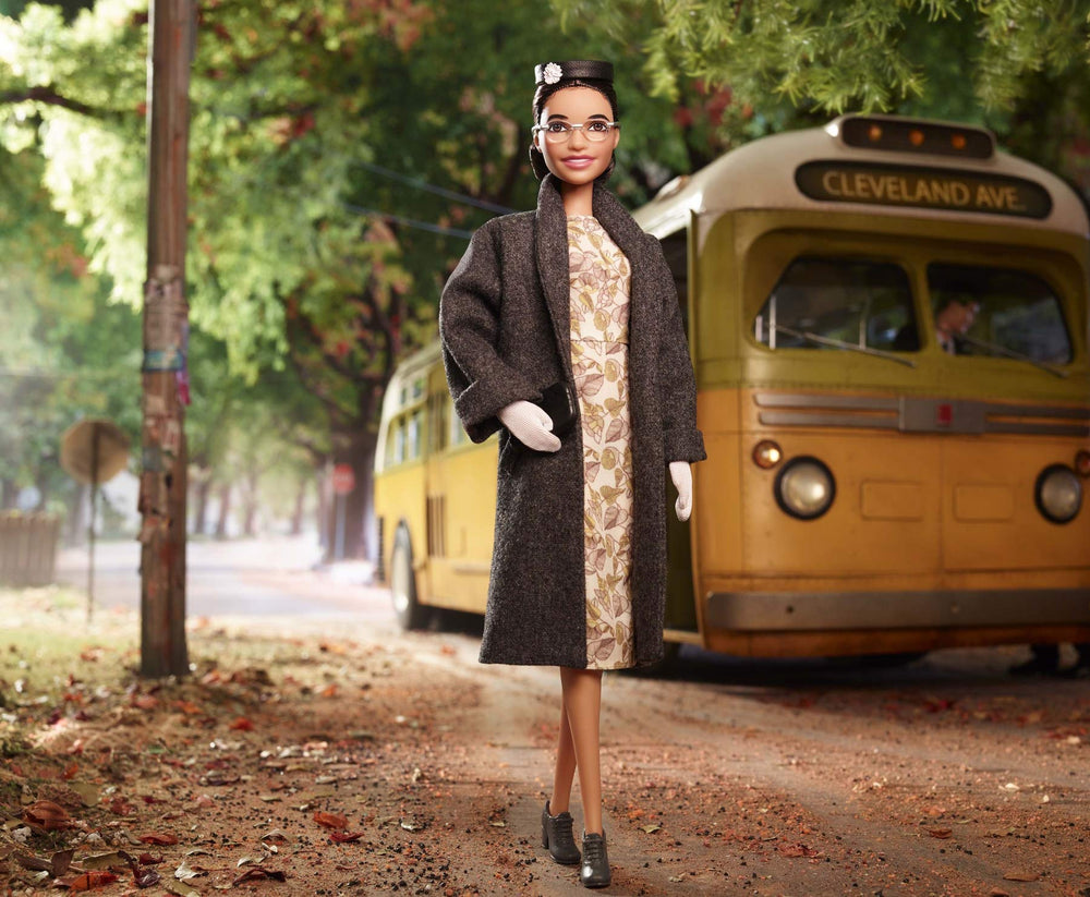 Barbie Rosa Parks with glasses and gloves for educational display.